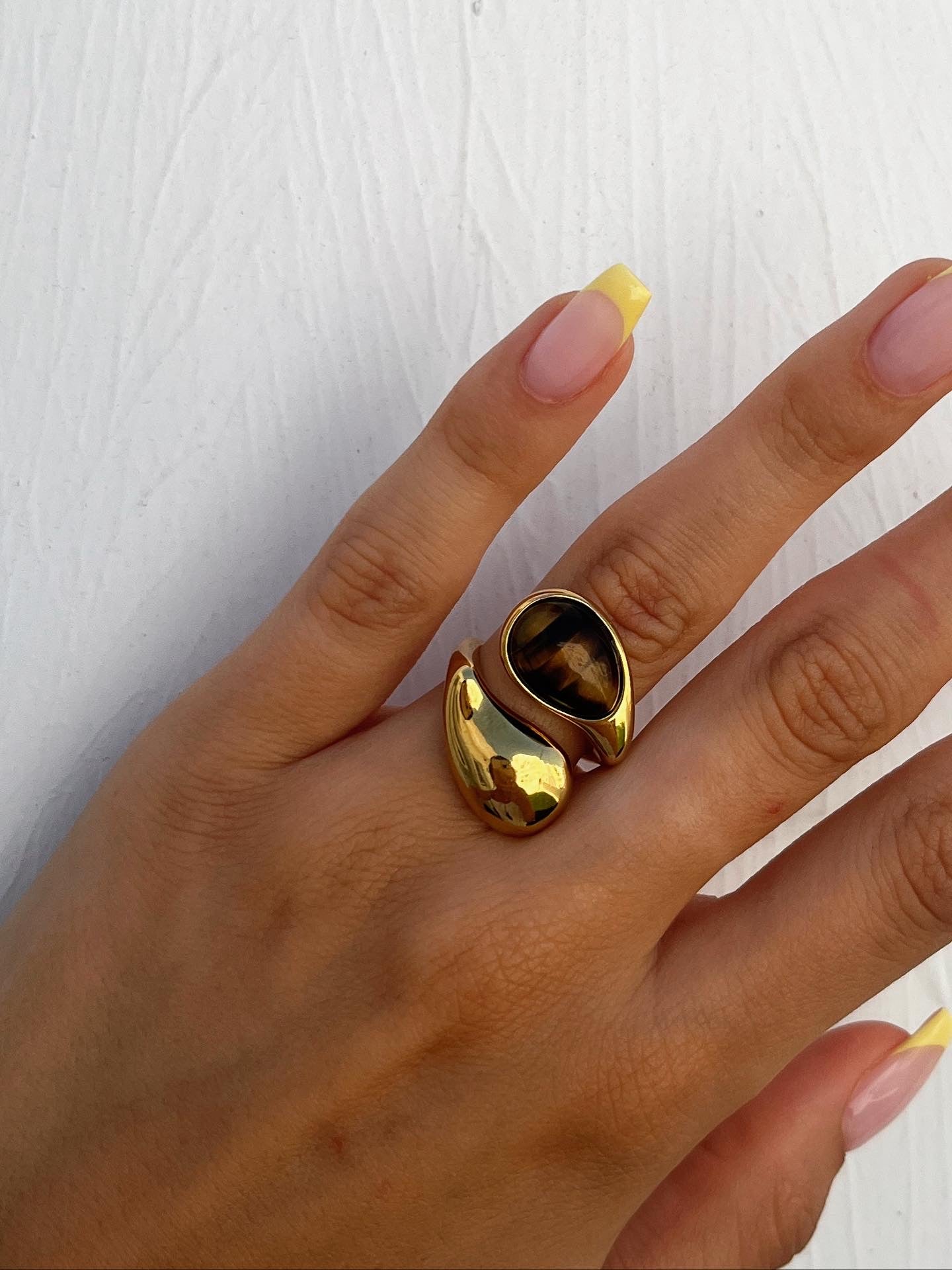 Two Sienna Rings displayed together on ceramic tray