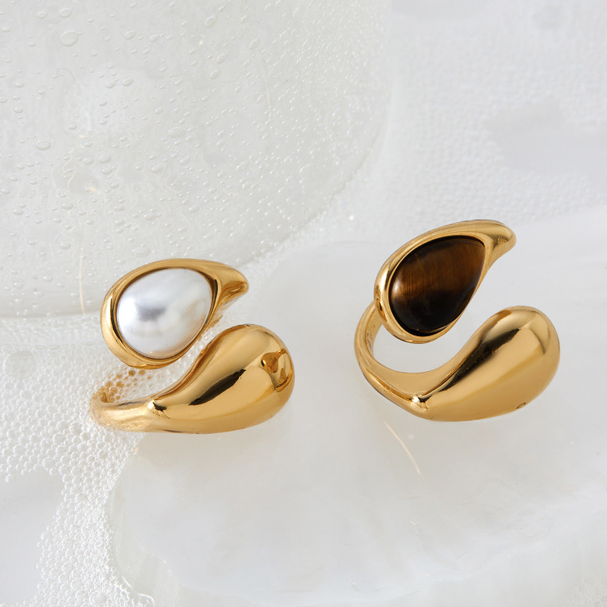 Styled flat lay of Sienna rings with natural Mediterranean light
