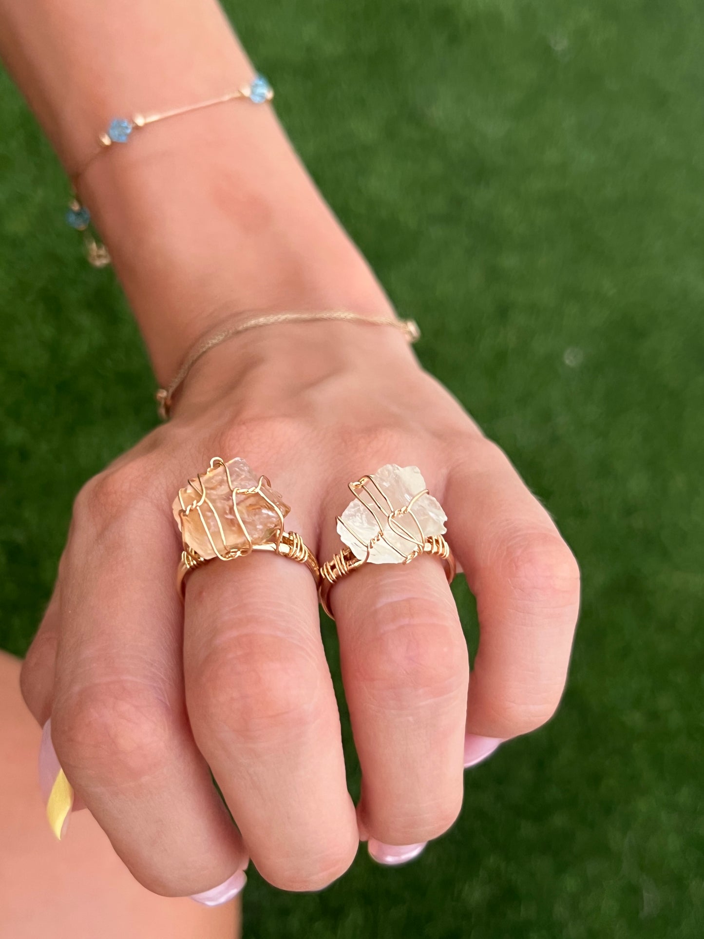 Lemon stone ring shown in hand close-up