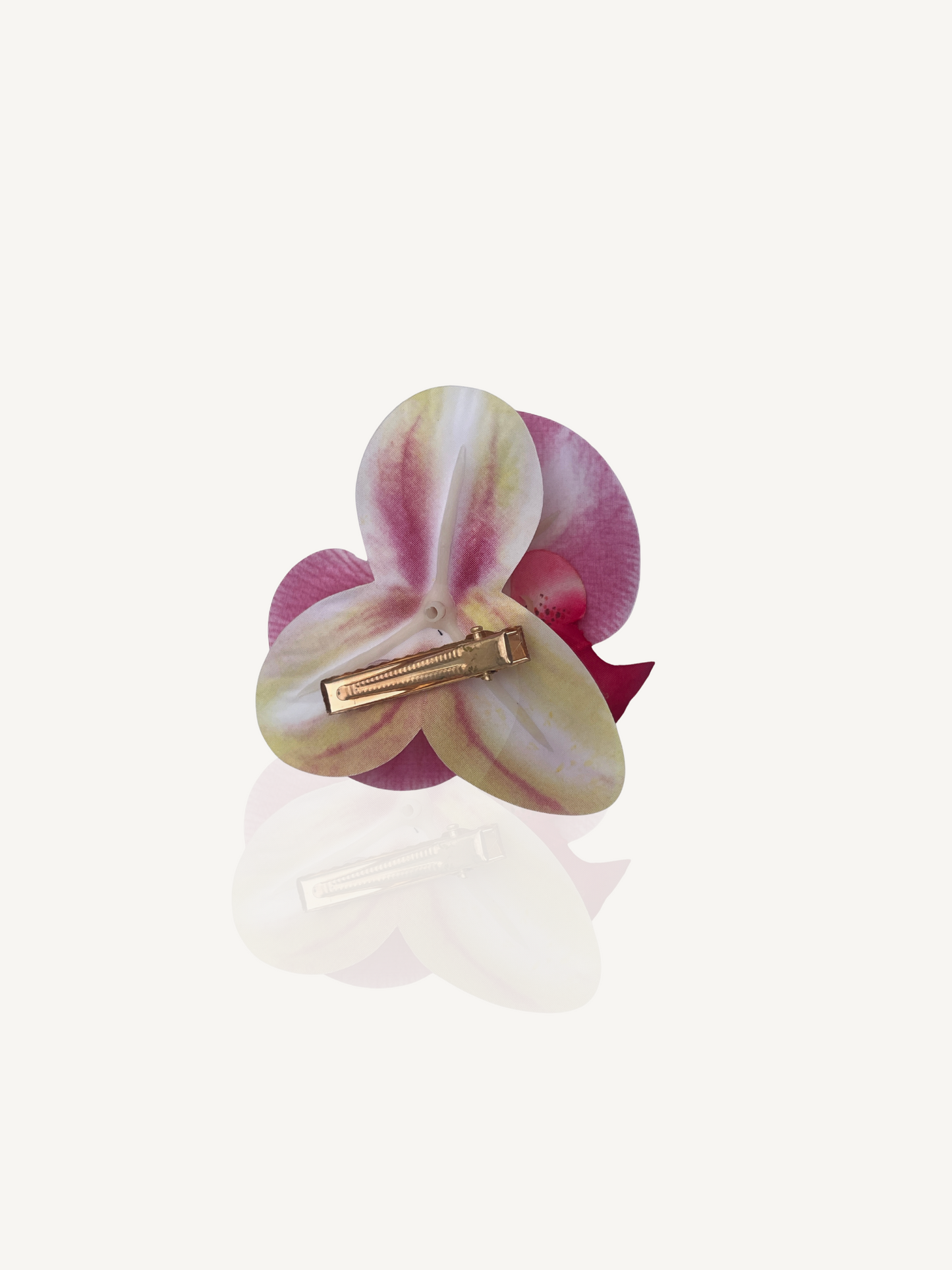 Pink bloom hair clip in beach-ready updo – lightweight clip by Luzé