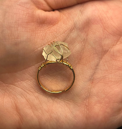 Sol Ring worn with other gold accessories on model hand

